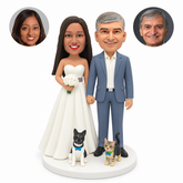 custom bobblehead figures wedding couple holding hands with the bride holding a bouquet and two fixed animal accessories