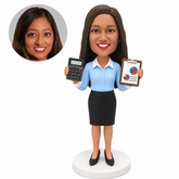 custom bobblehead figure female accountant holding a calculator and a clipped report with both forearms raised