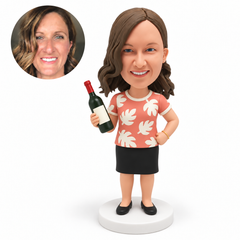 custom bobblehead figure woman holding a wine bottle in her right hand with her left hand on her hip