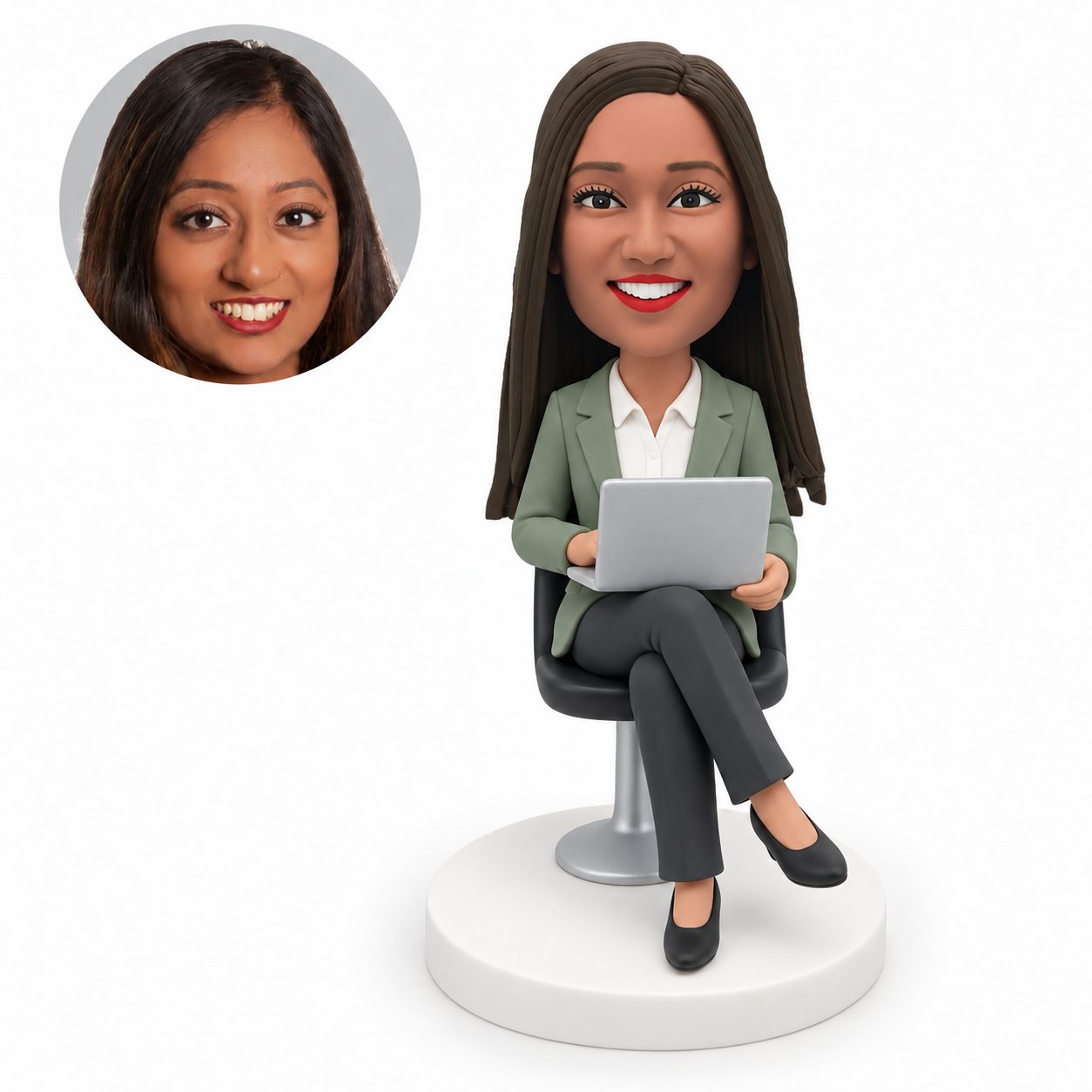 custom bobblehead figure businesswoman seated with crossed legs holding an open laptop on her lap with both hands