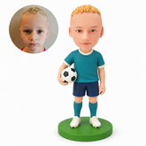custom bobblehead figure boy soccer player holding a ball at his hip with his other arm down
