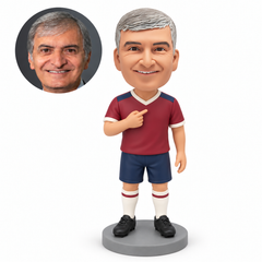 custom bobblehead figure male soccer player pointing at his chest with his other arm down