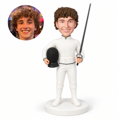 custom bobblehead figure male fencer standing with a mask at his waist and a foil held upright