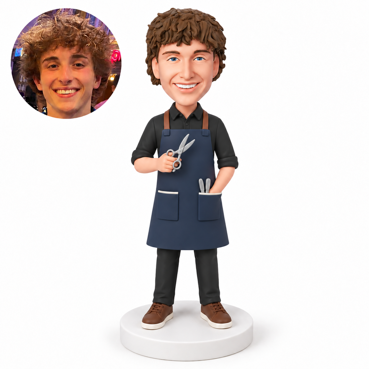 custom bobblehead figure male barber holding scissors with his other hand in an apron pocket