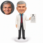 custom bobblehead figure male eye doctor holding an eye chart in his left hand with his right arm lowered