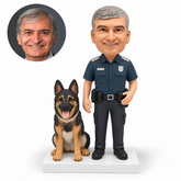 custom bobblehead figure male police officer with one hand on his belt beside a seated German Shepherd