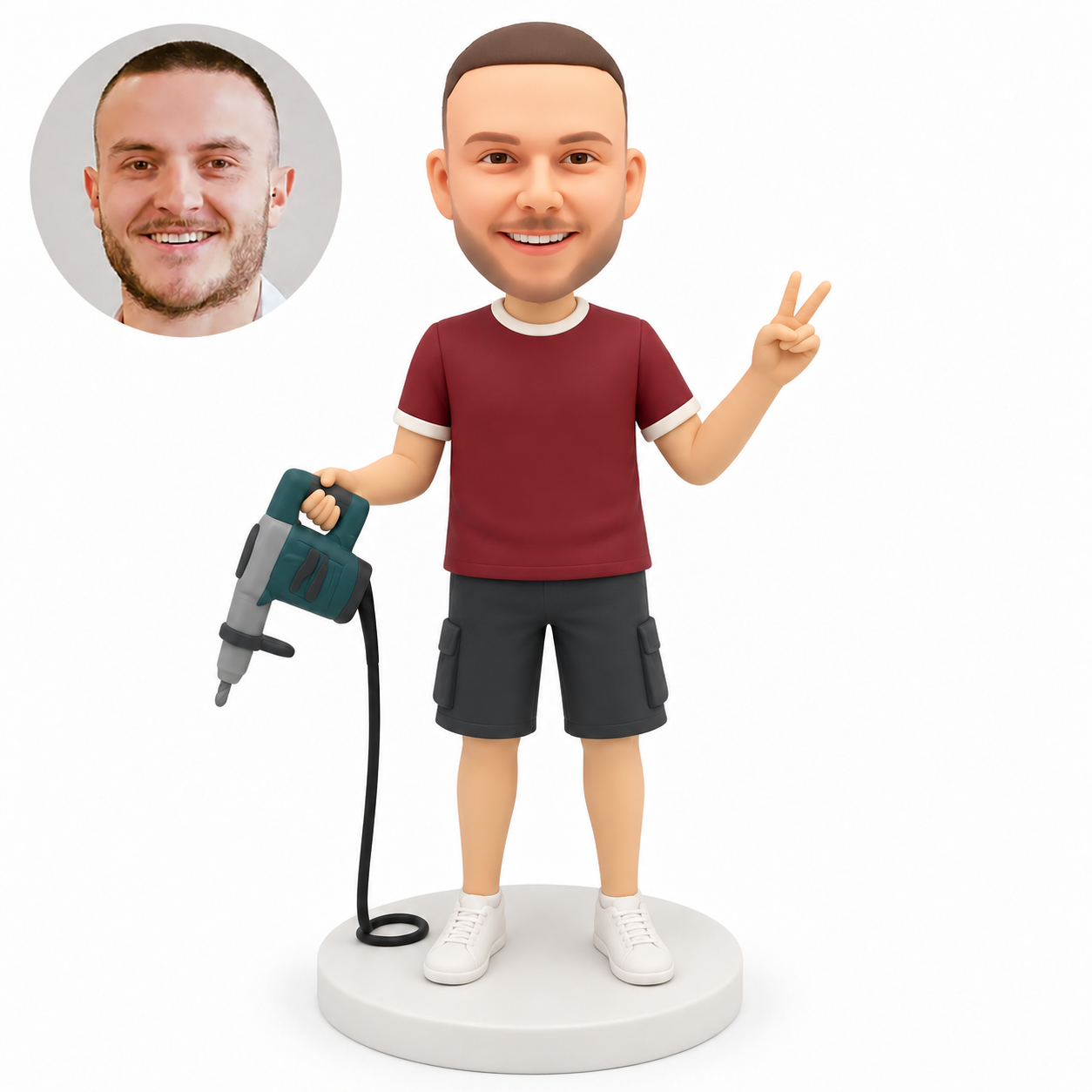 custom bobblehead figure man holding a corded power drill in his right hand and raising a V sign with his left hand