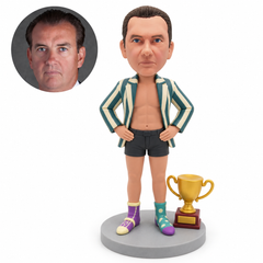 custom bobblehead figure man with both hands on his hips beside a floor-standing trophy