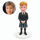 custom bobblehead figure young boy in a formal jacket and tartan kilt with his hands together