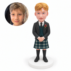 custom bobblehead figure young boy in a formal jacket and tartan kilt with his hands together