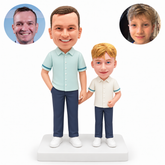 custom bobblehead figures father with one hand in his pocket beside his son with an empty hand bent at his waist