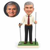 custom bobblehead figure man holding two separate golf clubs with one in each hand