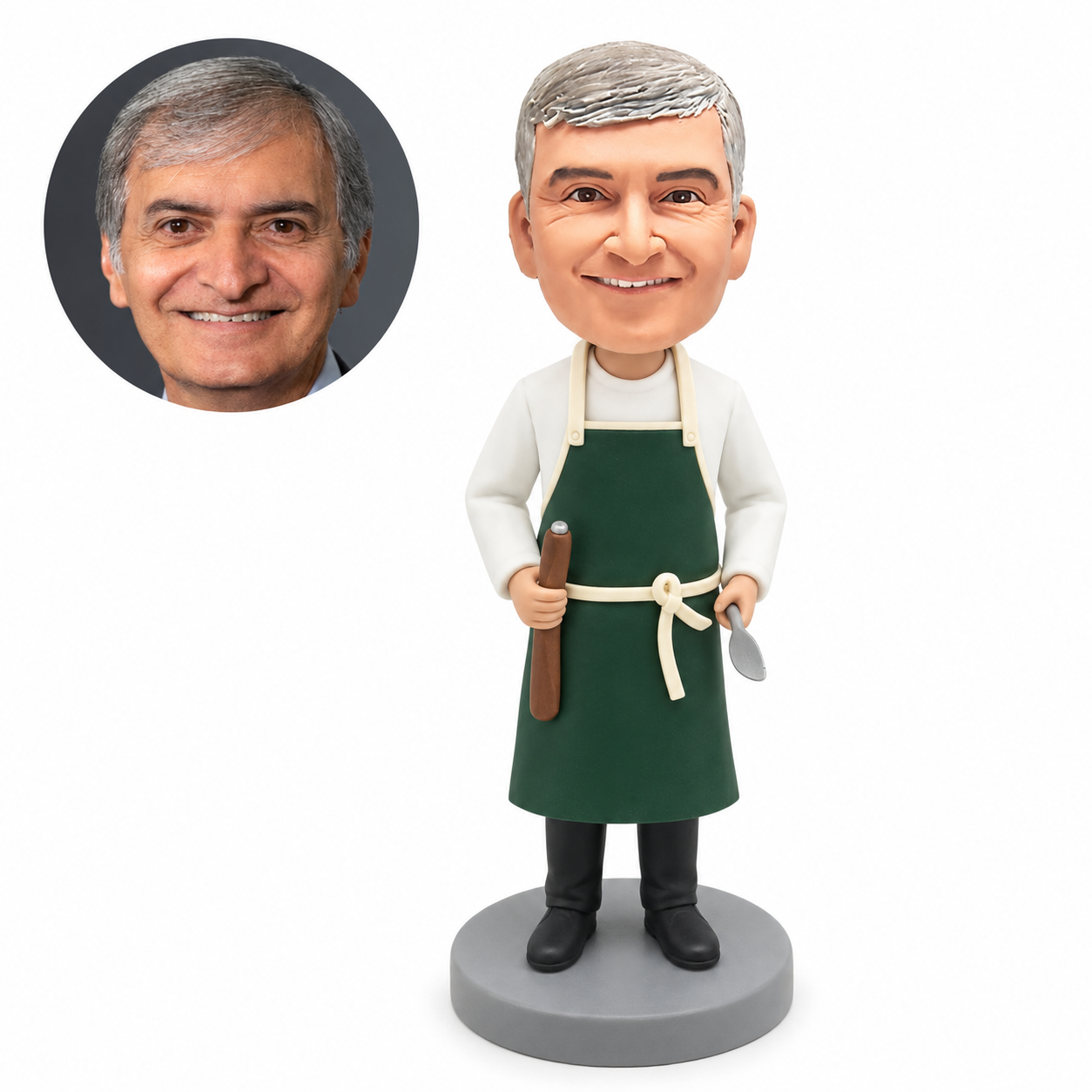 custom bobblehead figure male chef holding a long wooden kitchen utensil and a small silver utensil
