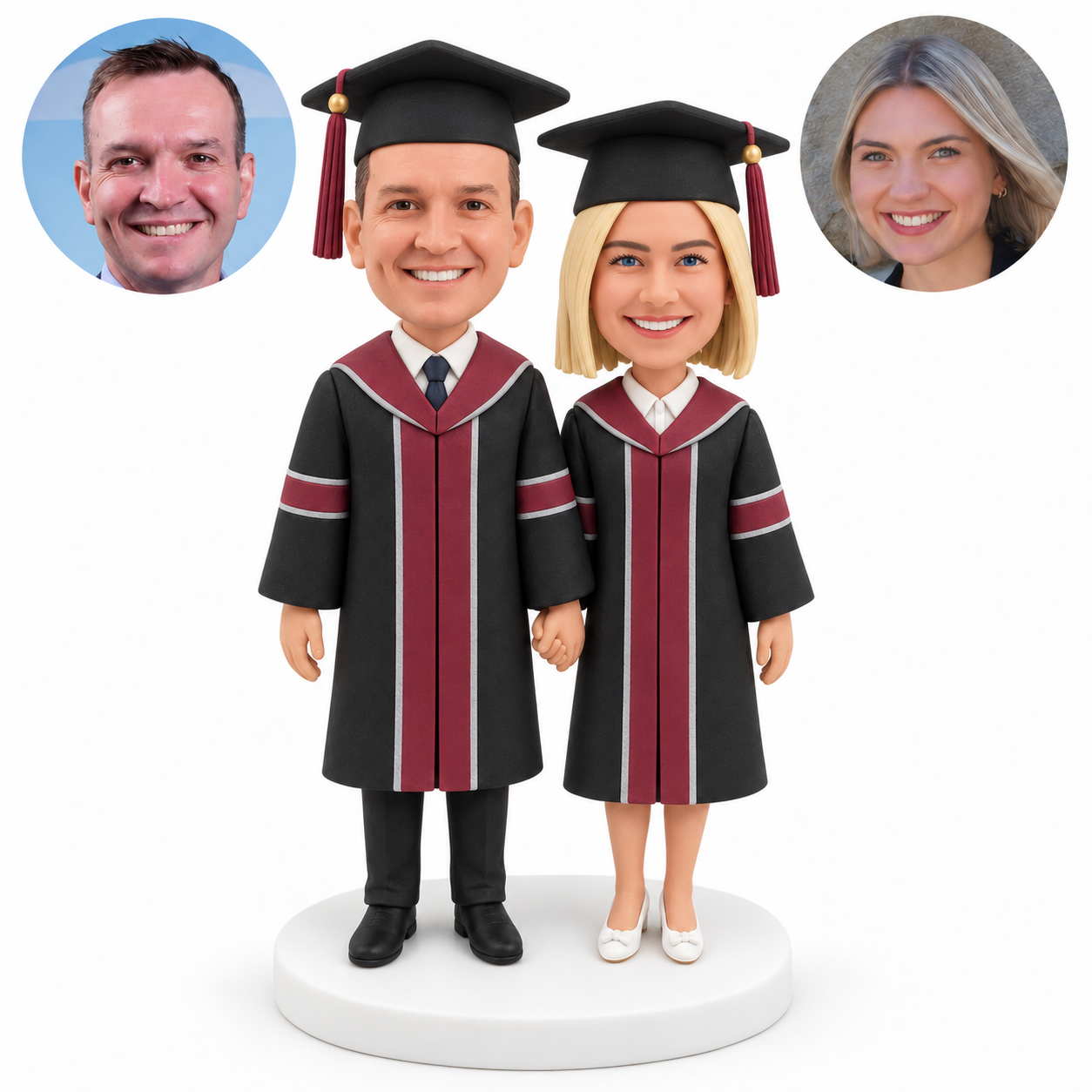 Two graduates in matching robes and caps standing side by side and holding hands