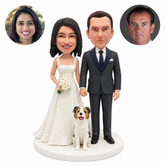 Custom clay wedding couple holding hands, bride carrying an ivory bouquet, fixed seated dog on an oval base, with two matching portrait photos