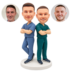 custom bobblehead figures two male nurses standing back to back with crossed arms and one bent leg