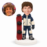 custom bobblehead figure male snowboarder standing beside his snowboard