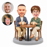 custom bobbleheads figures couple drinking coffee at a round table
