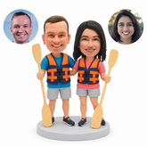 custom bobbleheads figures couple holding paddles in flotation vests