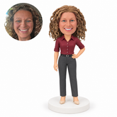 custom bobblehead figure businesswoman in a burgundy blouse with a hand on hip