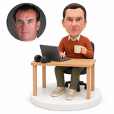 custom bobblehead figure remote worker at a laptop holding coffee