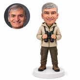 custom bobblehead figure outdoor man holding binoculars with both hands