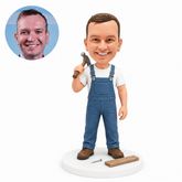 custom bobblehead figure carpenter with a hammer over his shoulder