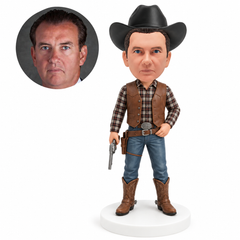 custom bobblehead figure cowboy in a vest holding a revolver at his side
