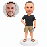 custom bobblehead figure man holding barbecue tongs with one hand on his hip