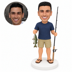 custom bobblehead figure man holding a fish and a fishing rod