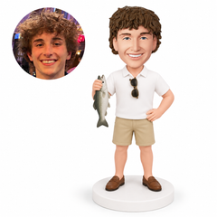custom bobblehead figure fisherman holding a fish with sunglasses at his collar