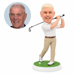 custom bobblehead figure golfer finishing a swing with an iron and one heel raised