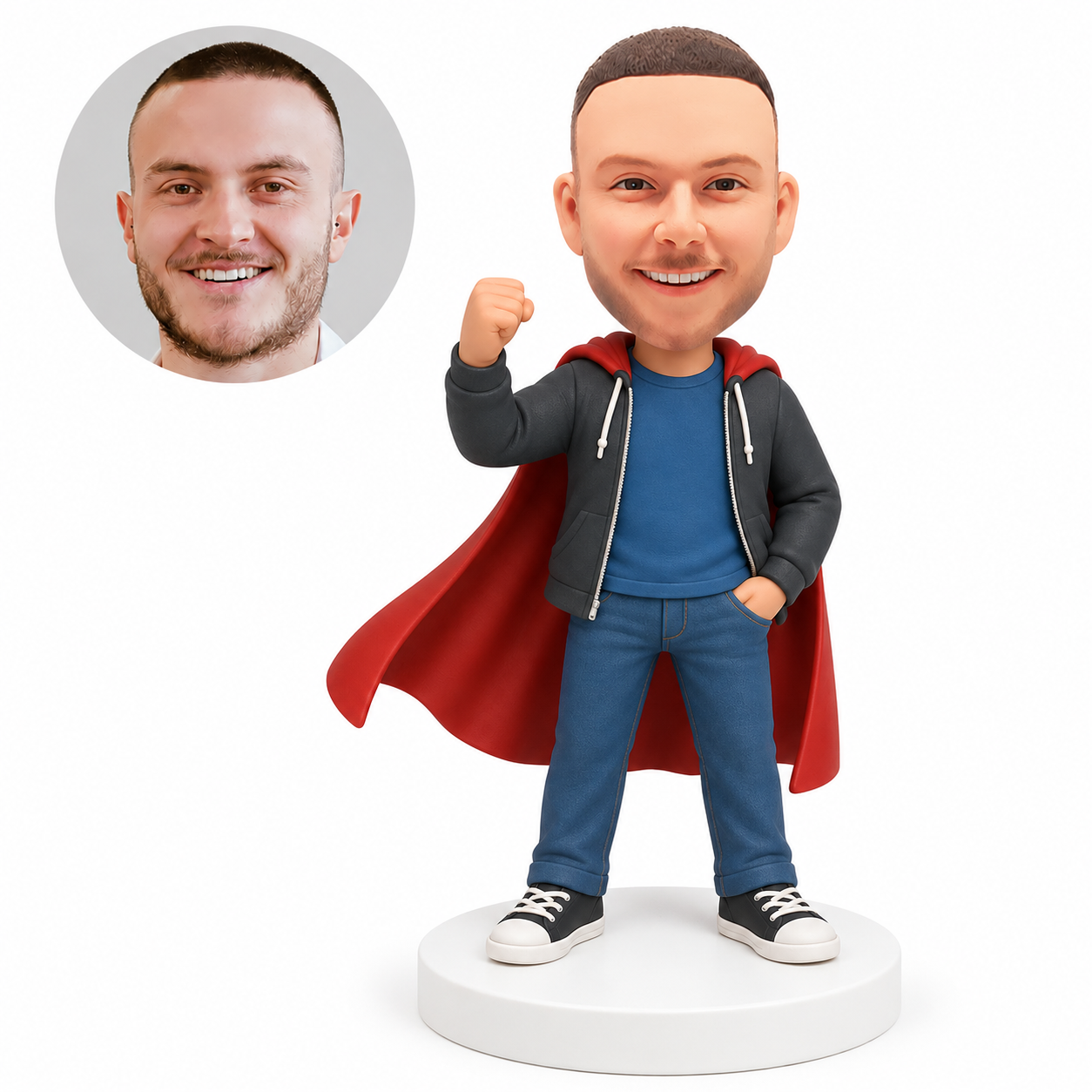 custom bobblehead figure man in an open hoodie raising a fist with a cape and one hand in his pocket