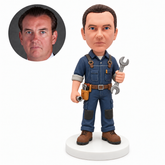 custom bobblehead figure mechanic in overalls holding a wrench and socket