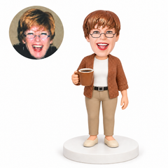 custom bobblehead figure woman in a knitted cardigan holding a coffee mug