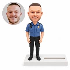 custom bobblehead figure policeman on a business card holder base