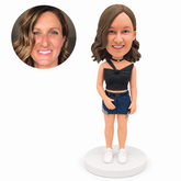 custom bobblehead figure woman in a diagonal strap crop top and denim mini skirt