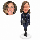 custom bobblehead figure woman in a military-style jacket and knee boots with a crossbody bag