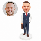 custom bobblehead figure businessman in a waistcoat holding a bag with one hand in his pocket