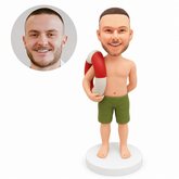 custom bobblehead figure shirtless man holding a life ring at his shoulder with his other hand behind his back