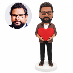 custom bobblehead figure man in an open shirt holding a large heart