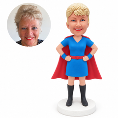 custom bobblehead figure woman in a short-sleeve hero dress and cape with both hands on her hips