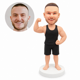 custom bobblehead figure muscular man in a tank top and shorts flexing one arm