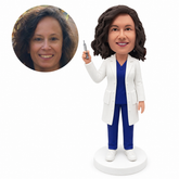 custom bobblehead figure female doctor in a lab coat and trousers holding a syringe