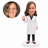custom bobblehead figure female pharmacist in a lab coat holding a medicine bottle