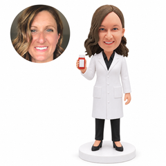 custom bobblehead figure female pharmacist in a lab coat holding a medicine bottle