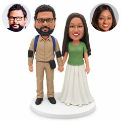 custom bobblehead figures couple holding hands in a field uniform and long skirt