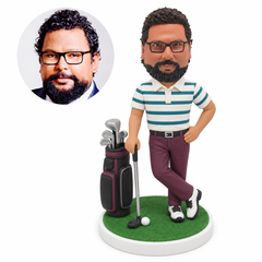 custom bobblehead figure golfer with crossed ankles holding a club beside a golf bag