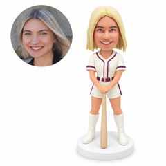 custom bobblehead figure female baseball player in shorts and tall boots resting both hands on a bat