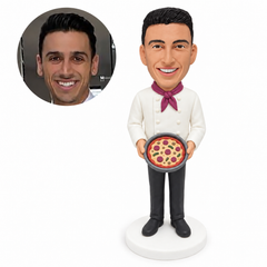 custom bobblehead figure chef holding a whole pizza in a round pan